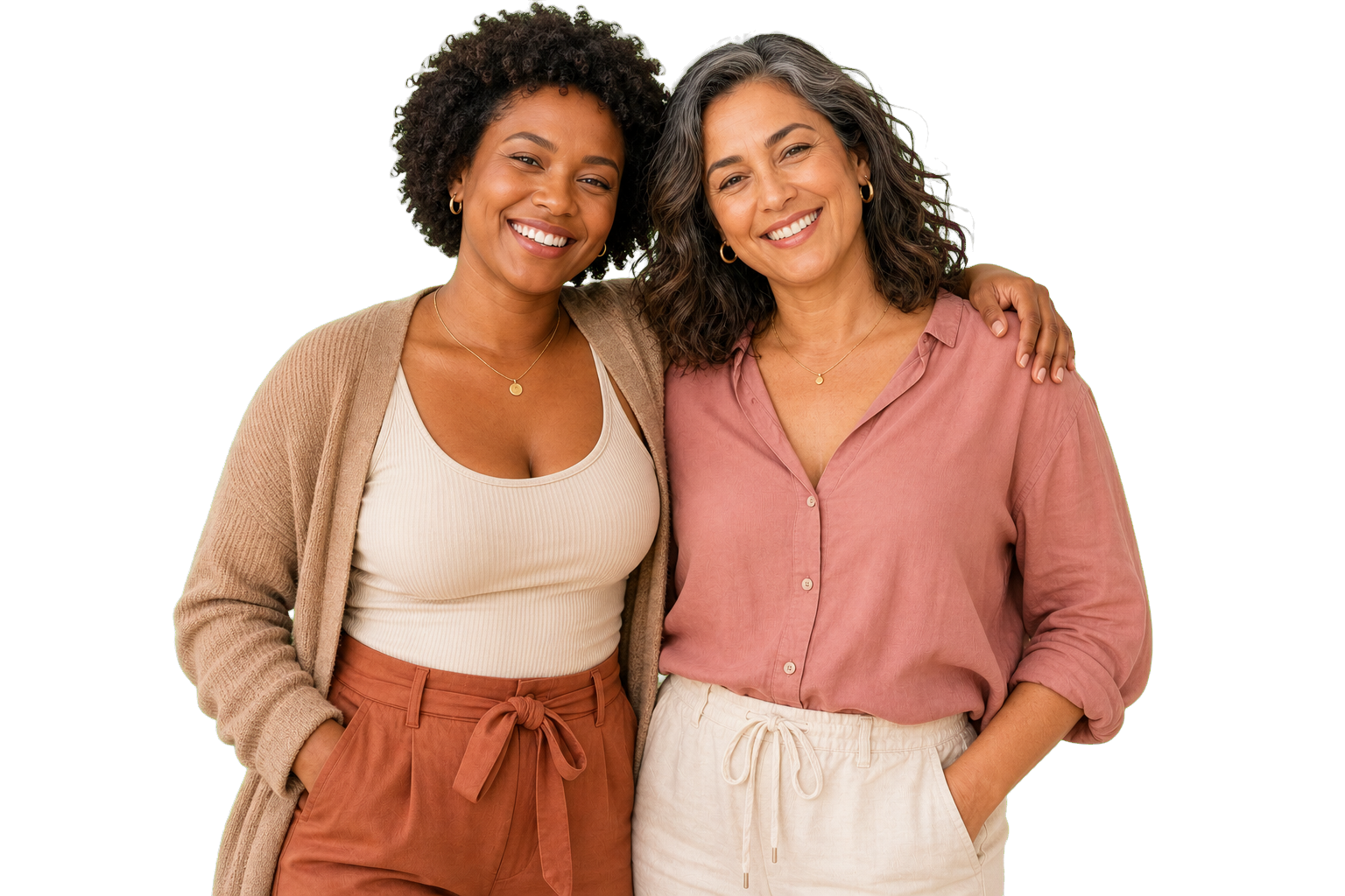Three women smiling together in soft natural light